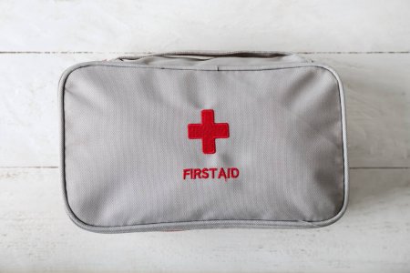 depositphotos_243680258-stock-photo-first-aid-kit-white-table Легка аптечка L-Pack для транспортування